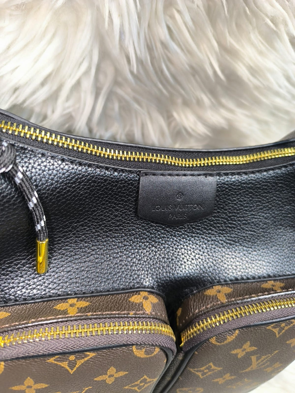 Louis Vuitton Utility Bag in Monogram Canvas