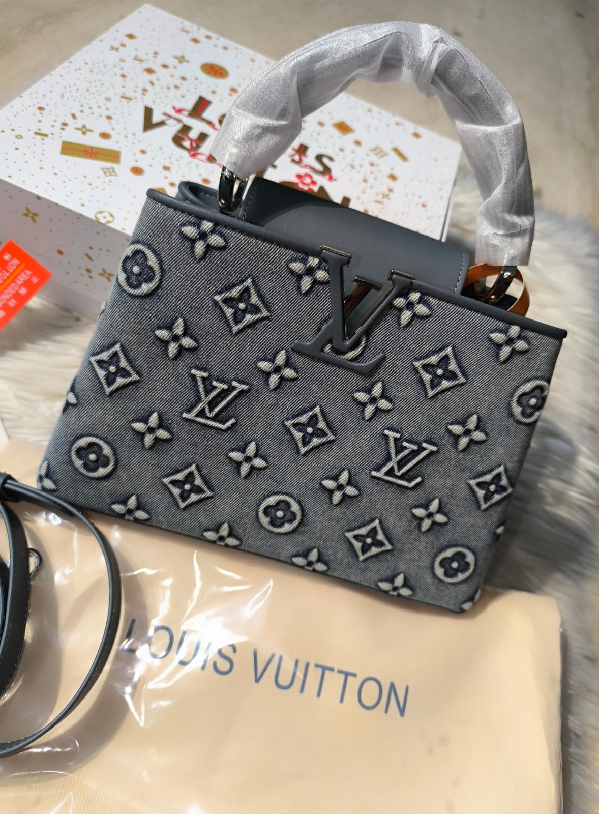 Louis Vuitton Denim Capucines Bag
