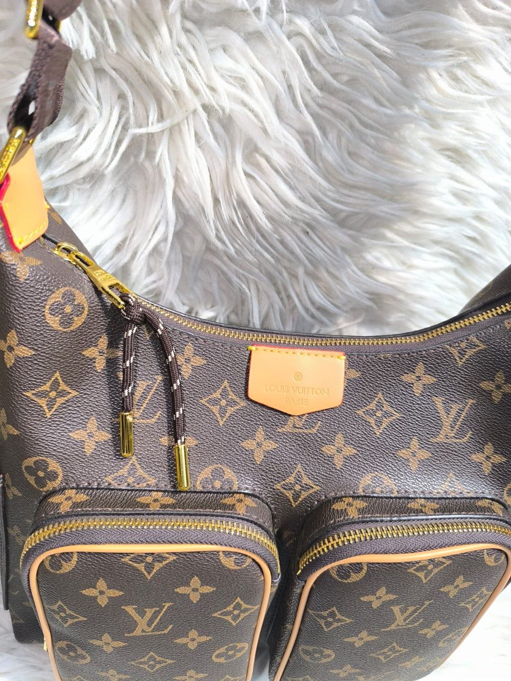 Louis Vuitton Utility Bag in Monogram Canvas