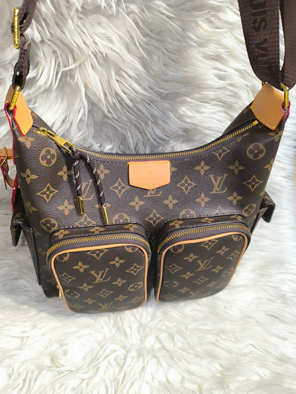 Louis Vuitton Utility Bag in Monogram Canvas