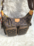 Louis Vuitton Utility Bag in Monogram Canvas